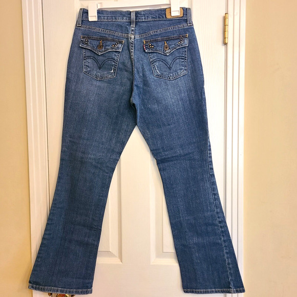 Levi's 515 Boot Cut Mid Rise Jeans Med Wash Back Pocket Detail, Womens Size 4S - Picture 1 of 10